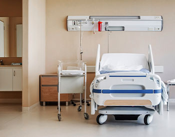 Hospital bed and a place for a newborn baby. High quality photo